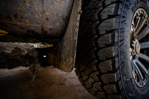 Action still of SAHARA A/T II lower tread, close up view on dirt
