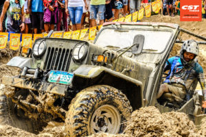 Barili Offroad 4x4 vehicle mud thrashing with Land Dragon tires.