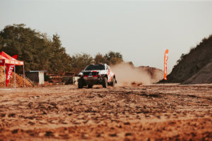 CST Sponsored team BAS AUTO SPORT vehicle action still, at a distance.
