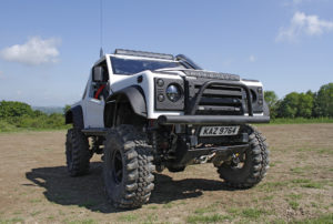 Image of white Land Rover with CST Land Dragon tires in the in the UK, action photoshoot.