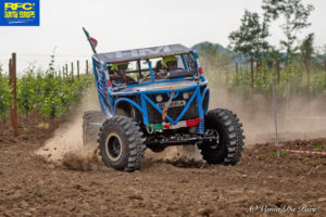 CST-SPONSORED RED TEAM of Italy action shot of their 4x4 Vehicle and Land Dragon tires racing.