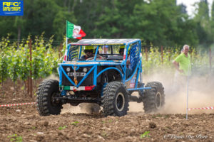 CST-SPONSORED RED TEAM of Italy action shot of their 4x4 Vehicle and Land Dragon tires racing.