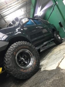 CST SAHARA M/T 2 mounted on Toyota Hilux with custom wheels. Sidewall view