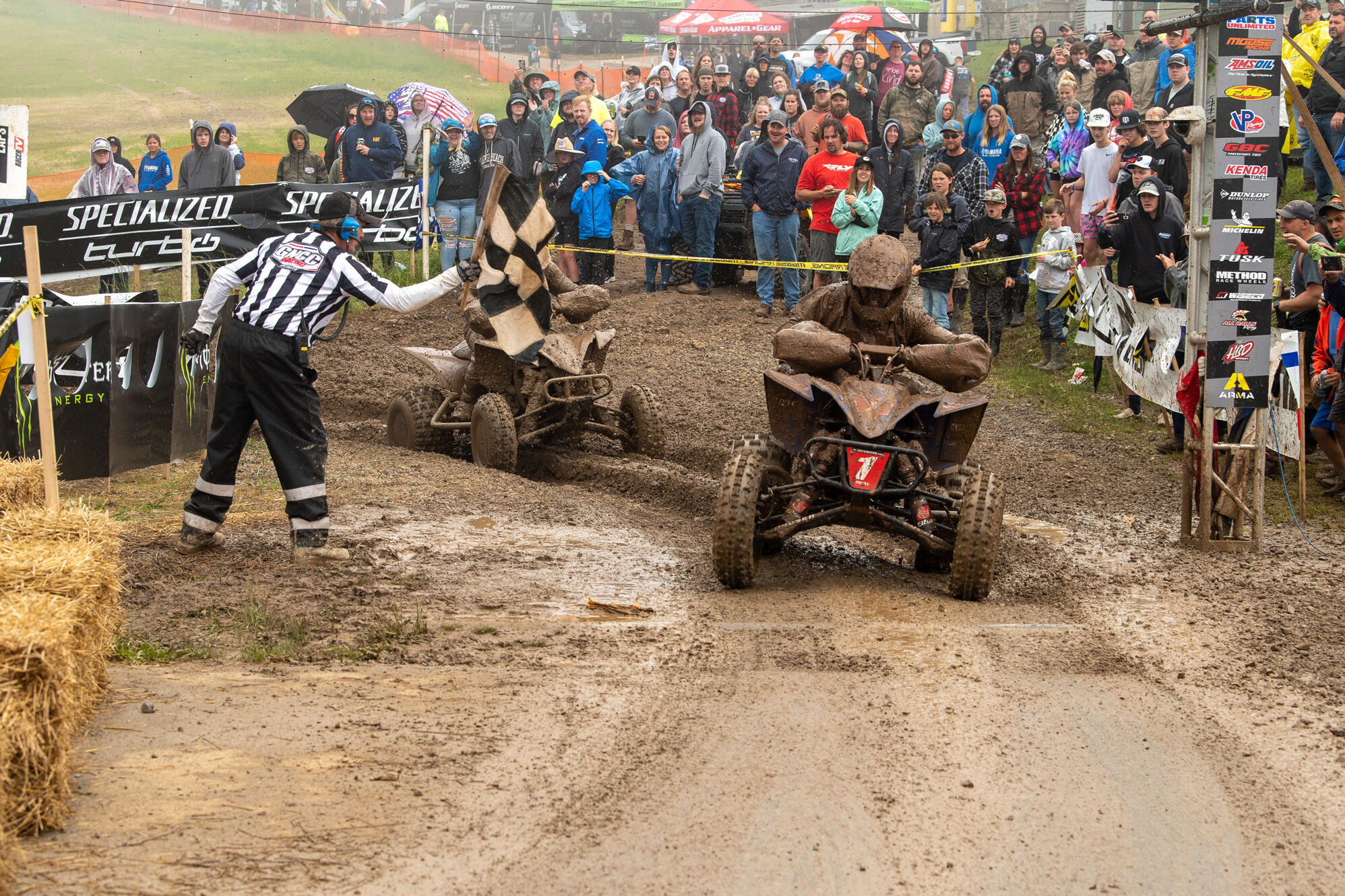 Brycen Neal racing through the muddy conditions and crosses the checkered flag and claims his fifth win of the season.