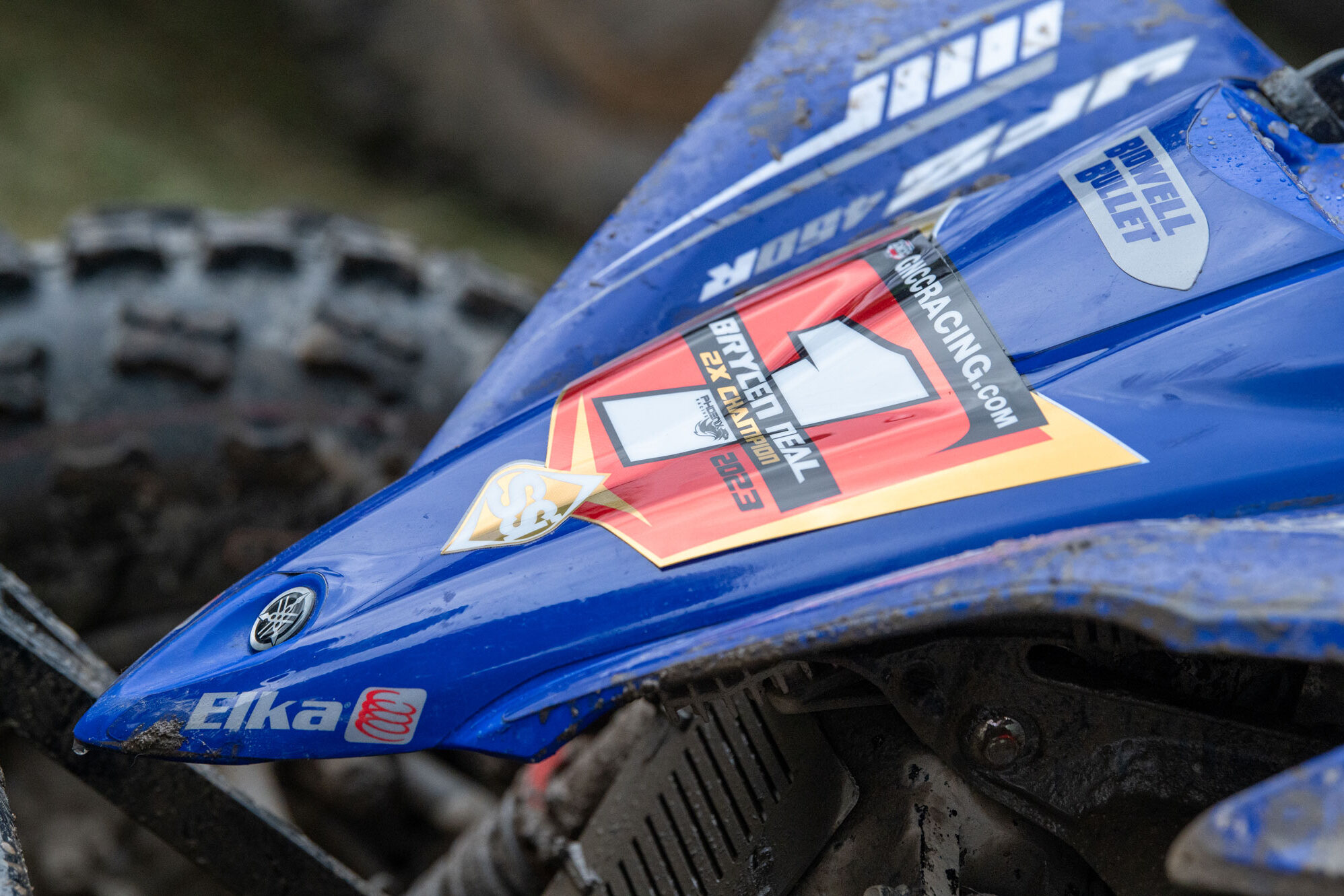 Close up of #1 Brycen Neal 2X Champion 2023 decal on the front of his ATV vehicle.