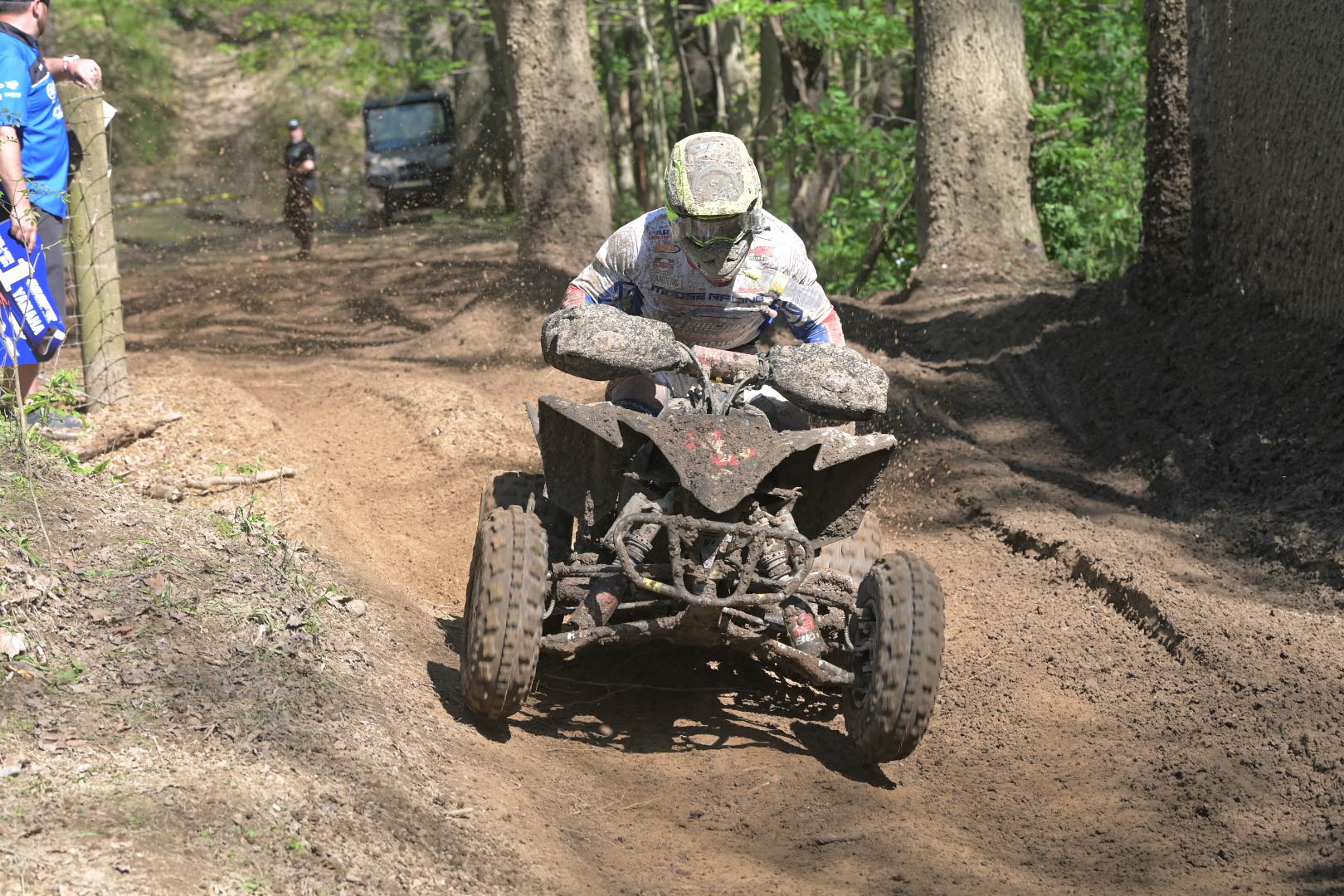 muddy atv racer