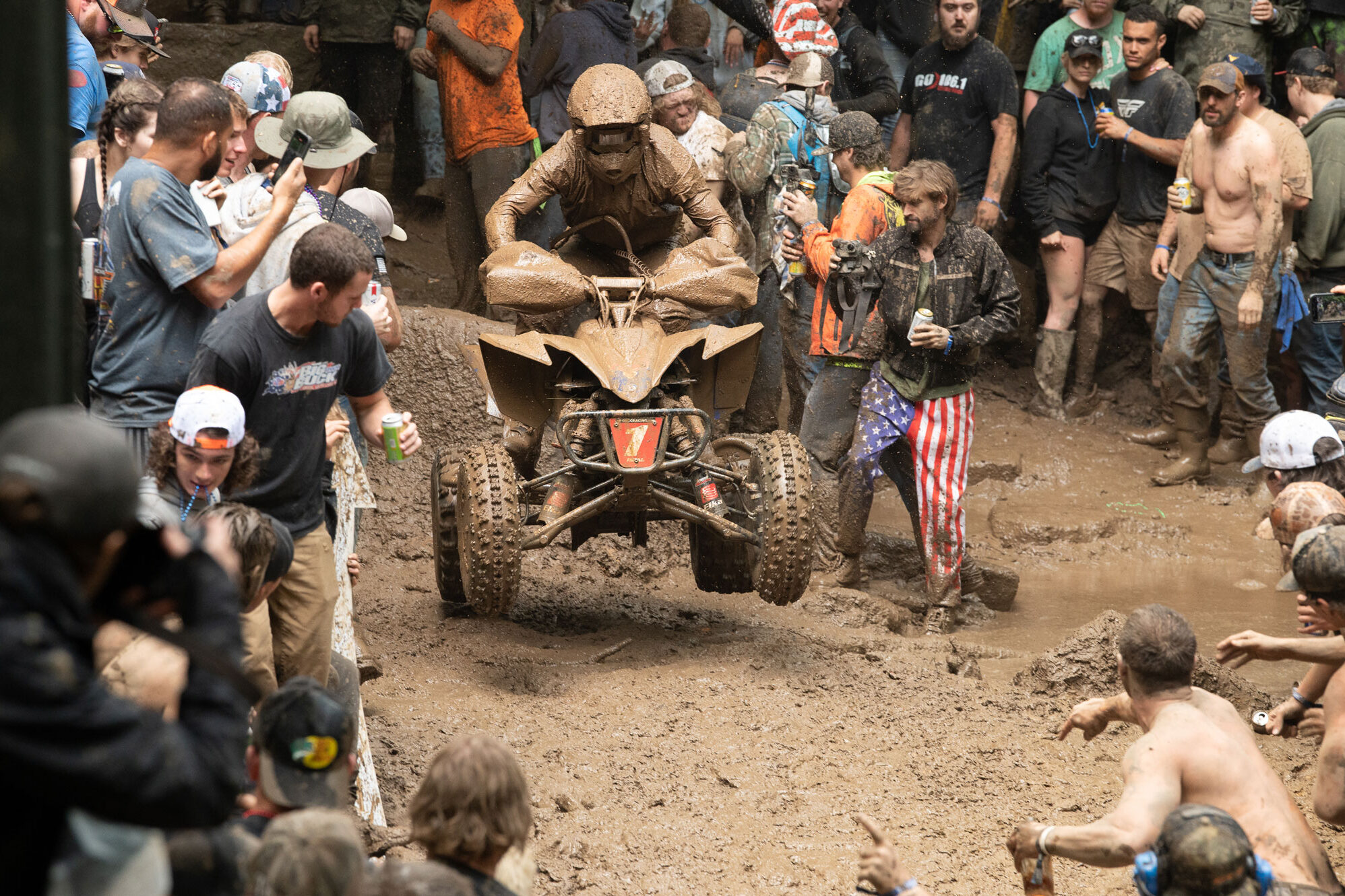 Brycen Neal racing through mud
